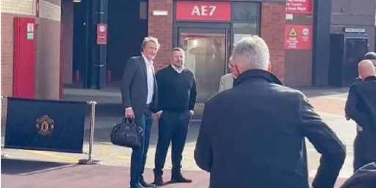 Sir Jim Ratcliffe, who is negotiating to purchase Manchester United, shows up in person at Old Trafford in this video.